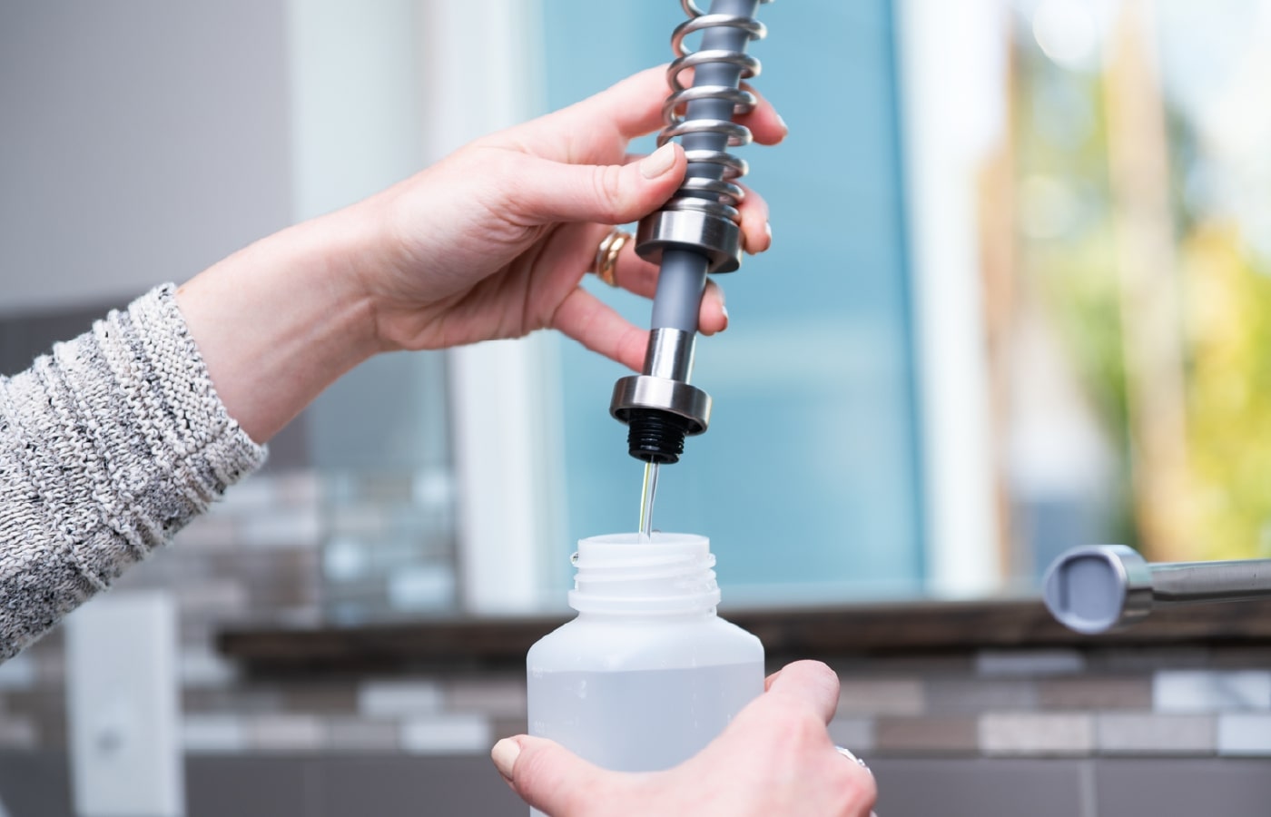 Water sampling at faucet with Tap Score test kit