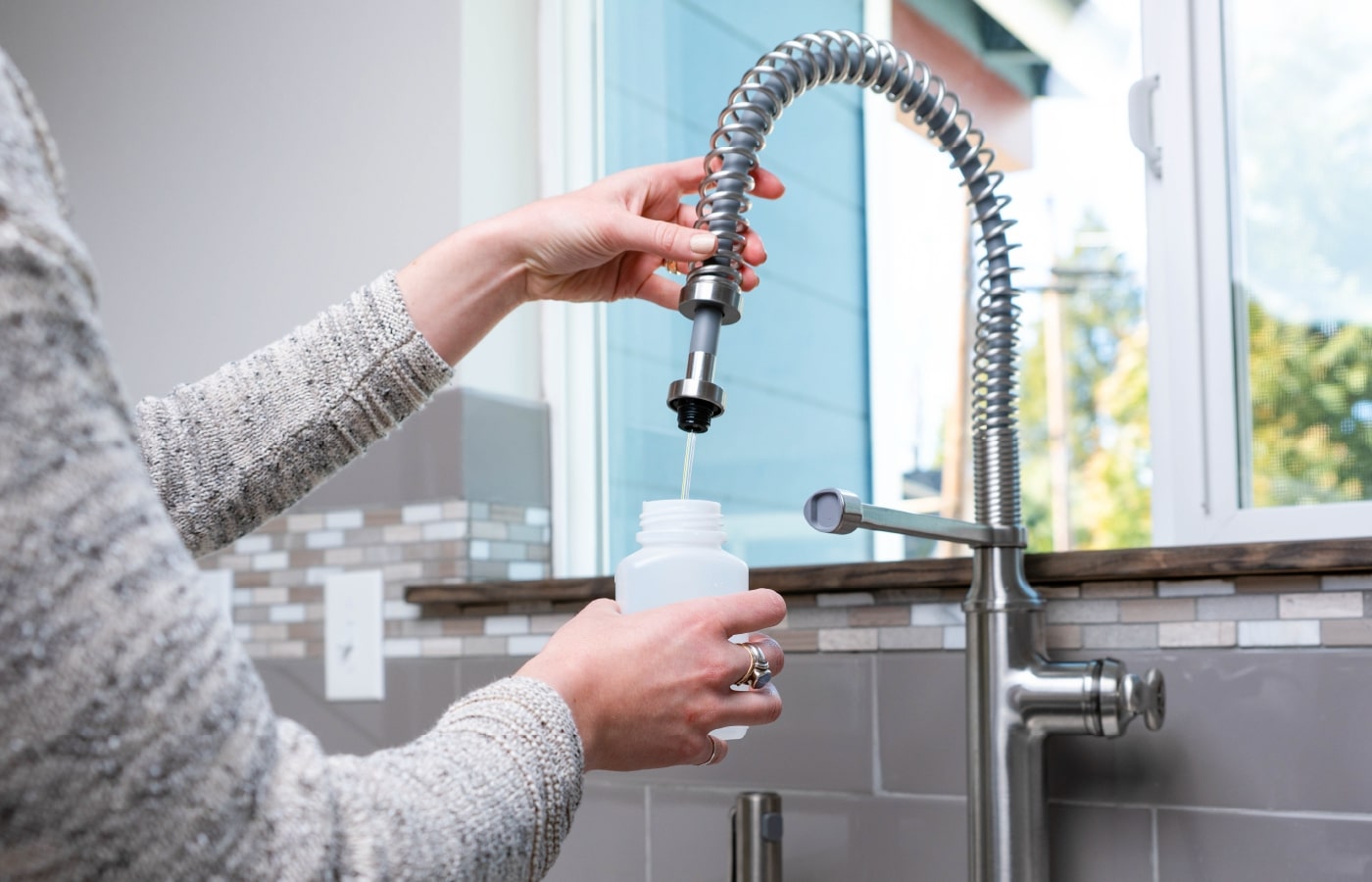 Tap Score city water test — sampling at faucet